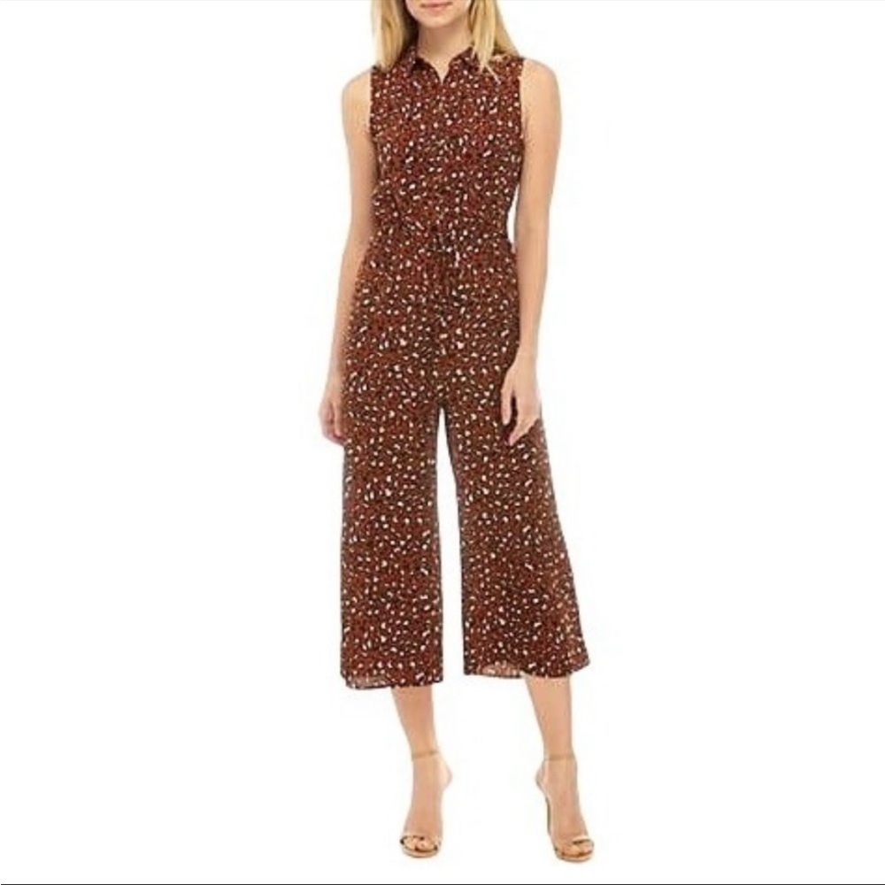 Animal print crop jumper. Sleeveless, collared button up w/ tie waist.